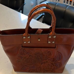 Patricia Nash satchel with Rose detail embossing. Used handful of times.